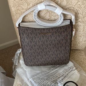 This Michael Kors shoulder bag is packaged straight from the stock room